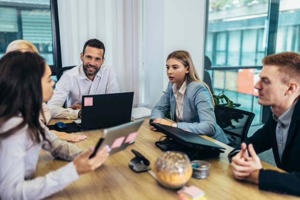 Business people having discussion during meeting stock photo