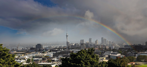 Auckland City  with rainbow in the sky  background at New Zealand