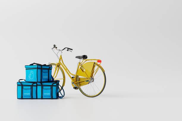 istock Yellow bicycle with a bag with food on a white background. 1443226568