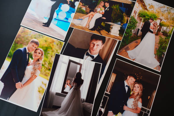istock printed wedding photos on a black background. 1443227139