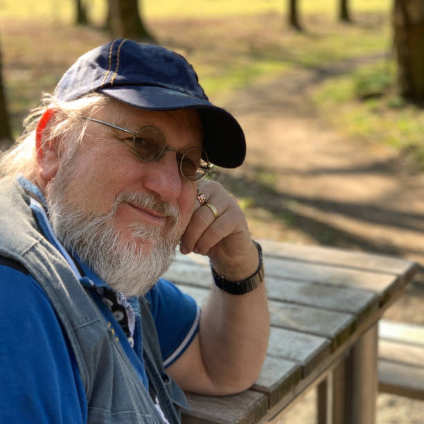 istock Close-up of a man sitting in a forest environment 1443229169