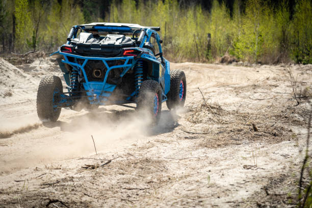 istock Summer UTV, ATV & offroad driving in dust. Quad racing 1443229282