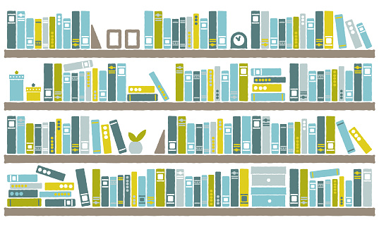A lot of books lined up on a large bookshelf, cute blue color scheme