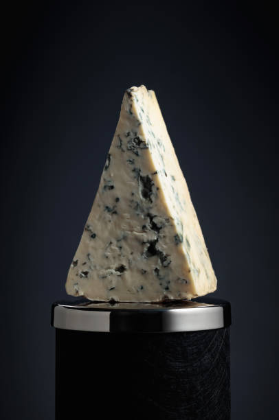 istock Triangle piece of blue cheese. 1443232564