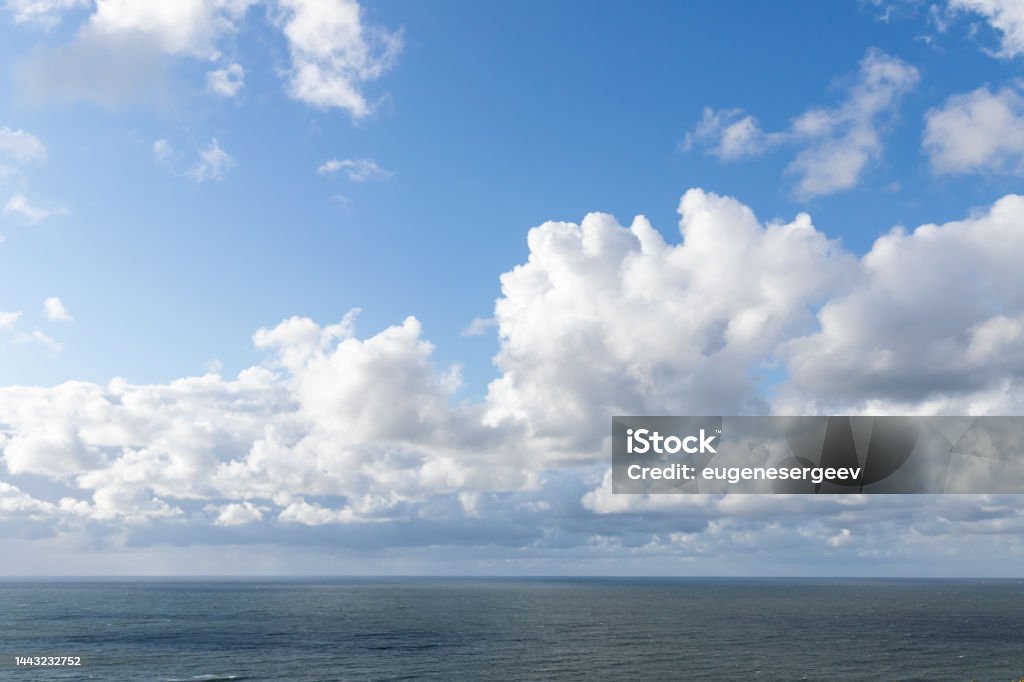 Baltic Sea is under cloudy sky on a sunny day Baltic Sea is under cloudy sky on a sunny day. Seascape photo Backgrounds Stock Photo