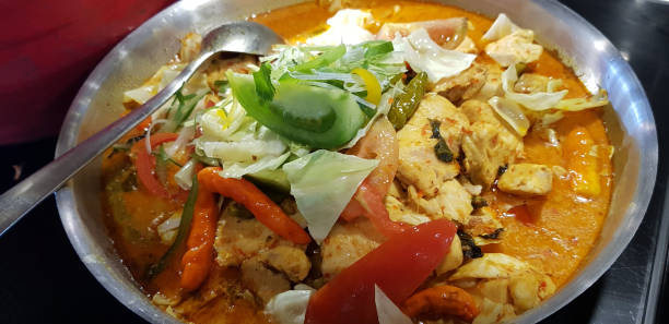 istock Selective focus Indonesian traditional dish mangut fish, made from smoked fish, cooked with coconut milk sauce 1443234286