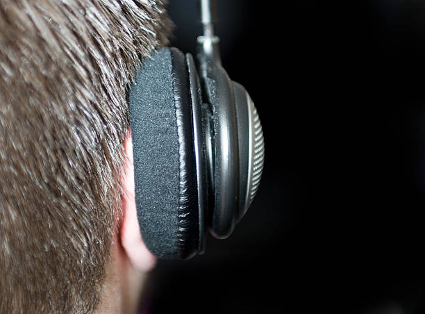 istock Headphones on man from behind 144323515