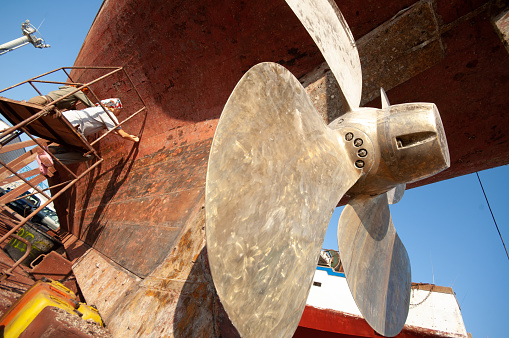 stern of a boat with a huge propeller
