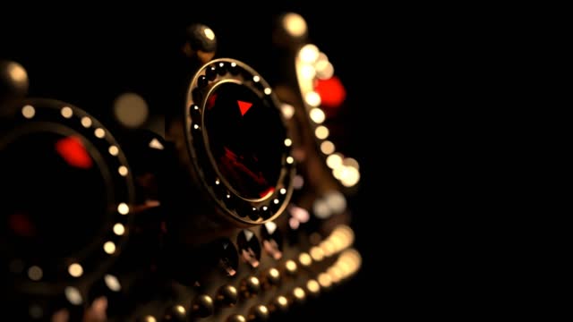 A golden crown with rubies on black background 3D 4K looped animation with copy space