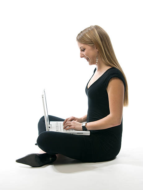 Woman with laptop computer stock photo