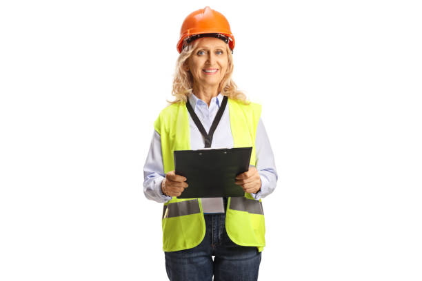 istock Female engineer with a safety vest and hardhat 1443237985
