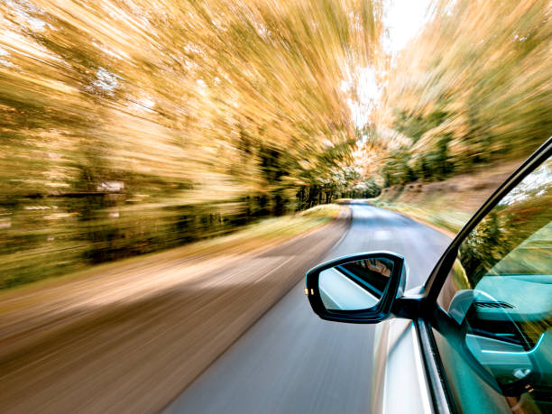 istock Driving on the road on a beautiful autumn day 1443239587