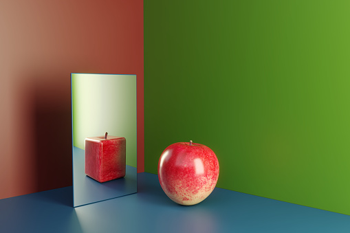 Surreal cube shaped apple reflection of a red apple. (3d render)