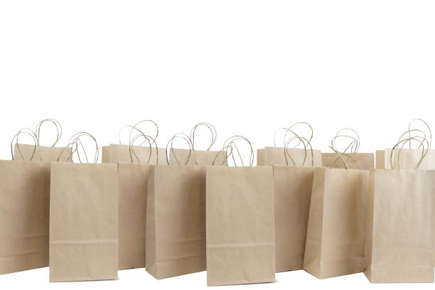 sales shopping bags in brown on white background stock photo