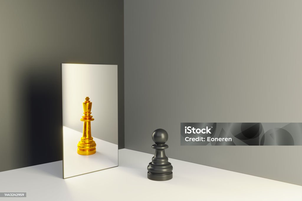 Chess pawn in a mirror reflecting himself as a king Black colored chess pawn standing in front of a mirror that reflects himself as a king. (3d render) Mirror - Object Stock Photo