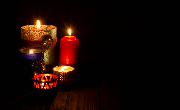 istock Candles light on wooden banner with copy space 1443244490