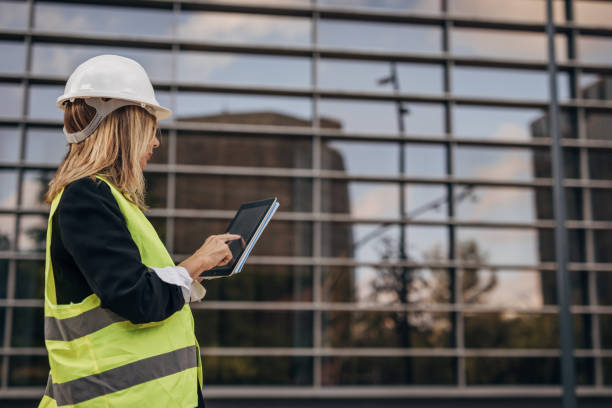 istock Senior construction engineer working on the construction site of an business center 1443244526
