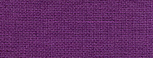istock Texture of dark violet color background from textile material with wicker pattern. Vintage lavender fabric 1443244874