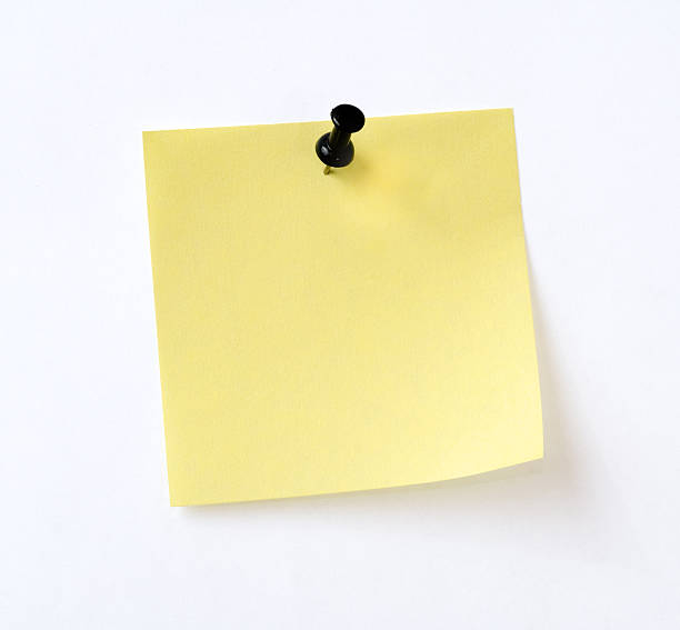 isolated yellow note yellow note with black pin over white background mail stock pictures, royalty-free photos & images