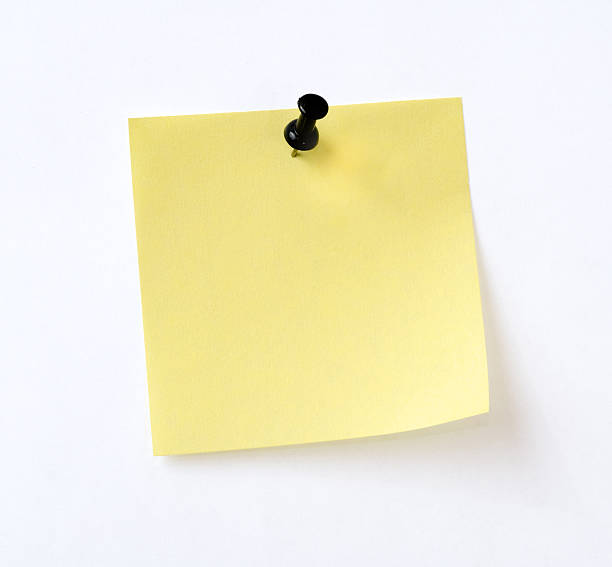 isolated yellow note yellow note with black pin over white background post stock pictures, royalty-free photos & images