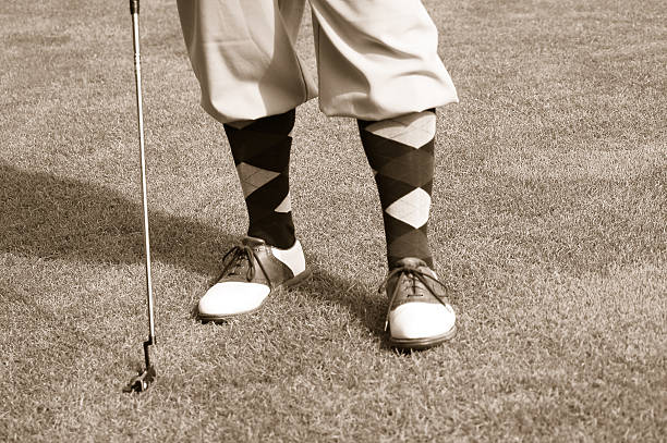 Antique golfer feet stock photo