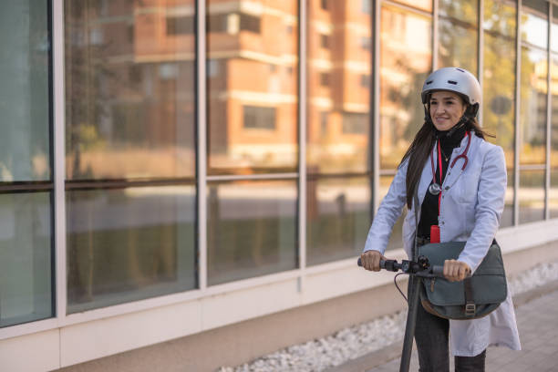 istock Female doctor riding scooter 1443250946