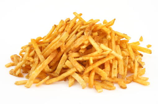 heap of French fries against white background, see also: