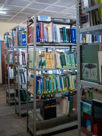 Busogo, Rwanda - April, 2013: bookshelves in the library of CAVM Busogo