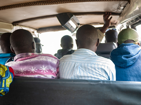 Musanze, Rwanda - May, 2013: passengers in the small bus