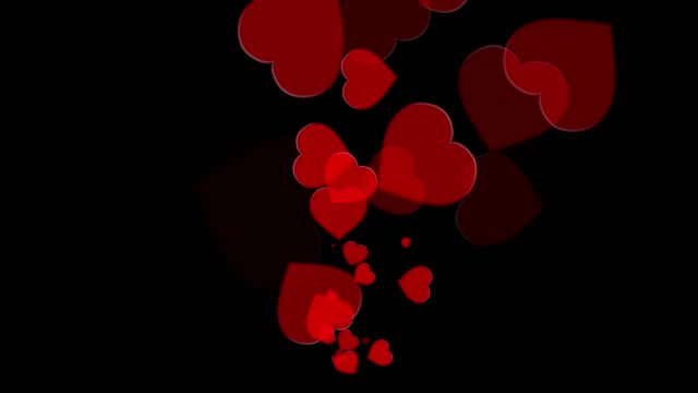Floating red hearts motion graphics with plain black background
