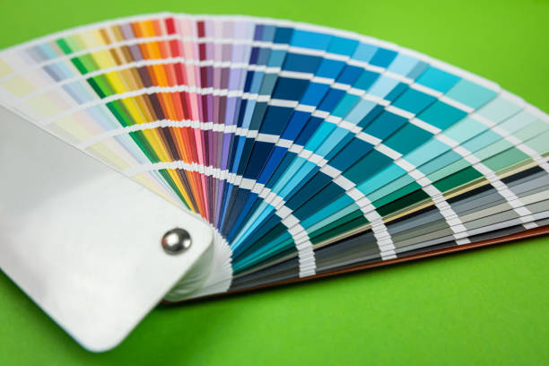 istock different sepmler color palettes arranged with a fan on the table isolated. 1443254760