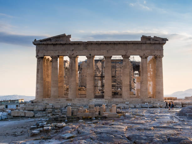 Frontal view of Parthenon temple on Acropolis hill at sunset. Famous ancient Greek temple, classic architecture, UNESCO World Heritage site. May 13, 2018 -  Athens, Greece