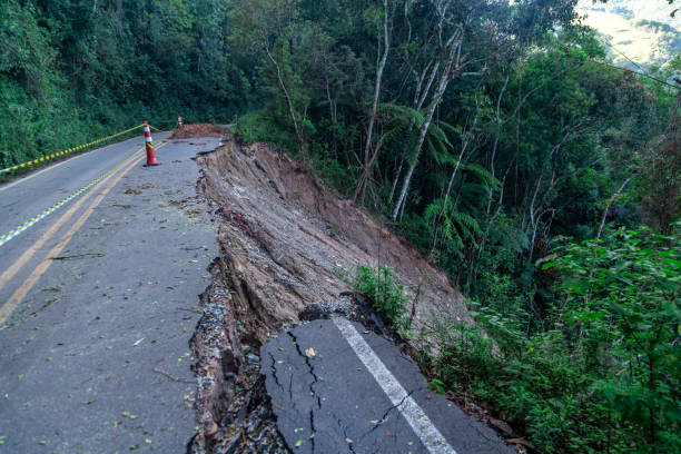 istock asphalt road damaged by a landslide in a mountain area 1443259315