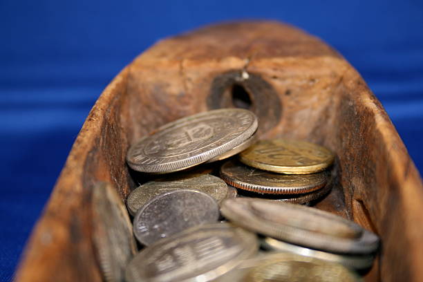 Coins in canoe stock photo