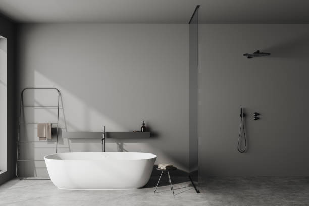 istock Front view on dark bathroom interior with bathtub, shower 1443261064