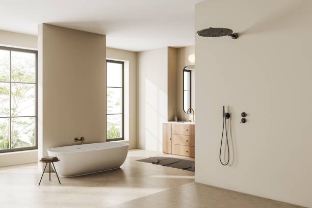 istock Stylish bathroom interior with bathtub and douche, window. Mockup empty wall 1443261403