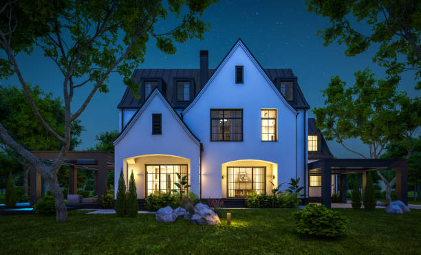 istock 3d rendering of white and black modern Tudor house in night 1443261976