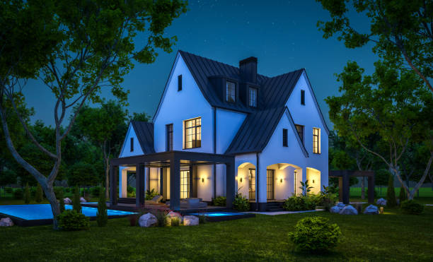 istock 3d rendering of white and black modern Tudor house in night 1443262067