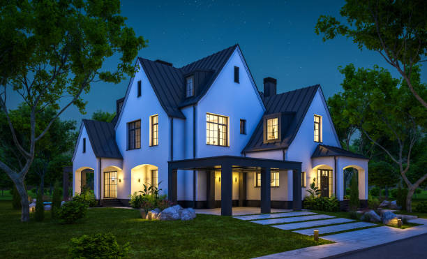istock 3d rendering of white and black modern Tudor house in night 1443262105