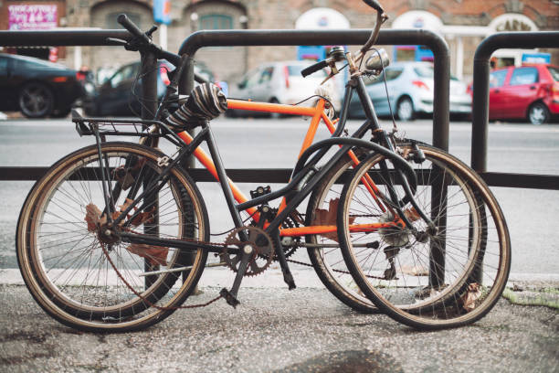 istock abandoned old rusty bicycles on city streets. 1443262876