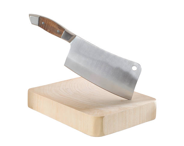 Meat-cleaver and chopping board stock photo