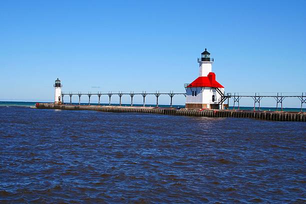 istock Red and white lighthouse at the sea 144326572