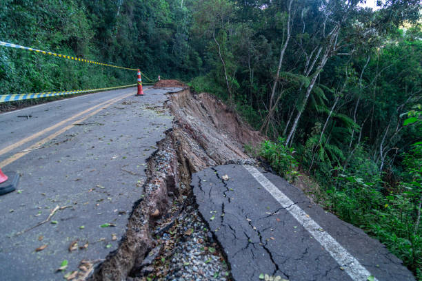 istock asphalt road damaged by a landslide in a mountain area 1443267000