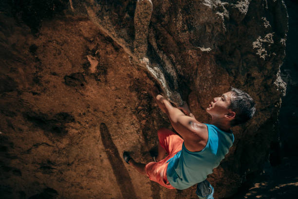istock Adventurous rock climbers in nature 1443269449