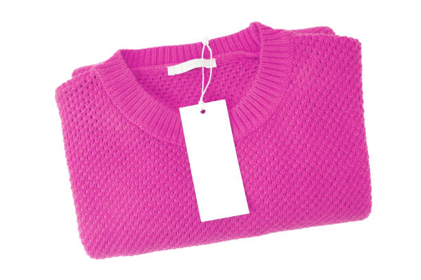 istock White blank rectangular clothing tag on pink knitted sweater isolated on white background 1443269858