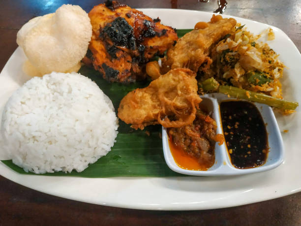 istock A plate of white rice and side dishes 1443270876