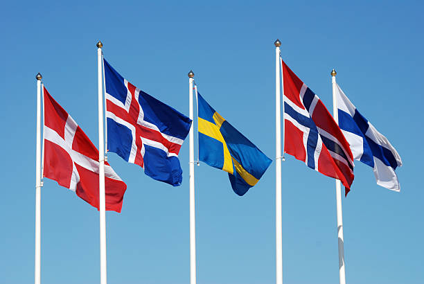 Scandinavian flags Scandinavian flags on a blue sky. scandinavian descent stock pictures, royalty-free photos & images