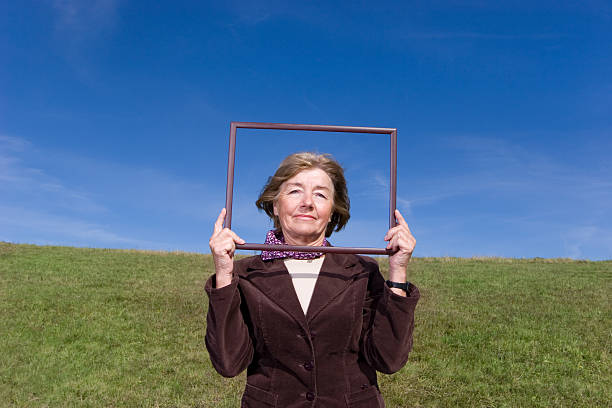Friendly woman in frame stock photo