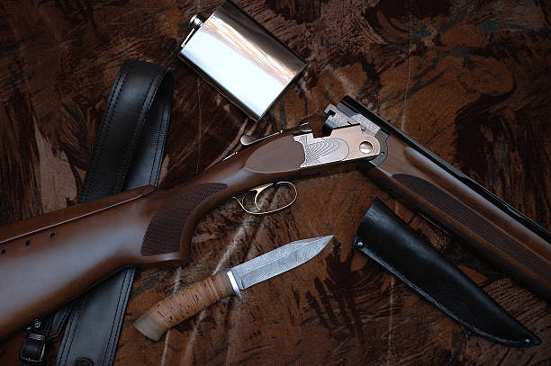 istock Hunt shotgun, knife and flask 144327778