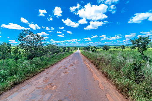 dirt road with potholes in Brazil.
